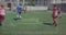 Animation of interface loading data over diverse group of male footballers in action on pitch