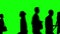 Animation of a large crowd crossing 4K video. Silhouette version. Close-up view. green background for background transparent use