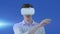 Animation of man in vr headset using virtual interface, with moving light, on blue
