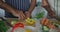 Animation of midsection of happy african american senior couple cooking together
