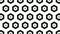 Animation of monochromatic hexagons arranged symmetrically in rows and rotating, on white background