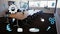 Animation of multiple digital icons against empty meeting room at office