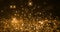 Animation of multiple glowing gold spots of light moving in hypnotic motion on brown background