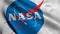 Animation of The National Aeronautics and Space Administration Flag. Realistic Fabric Texture Satin NASA Flag Background Video Wav