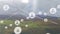 Animation of network of profile icons agains aerial view of grassland