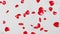 Animation pile of red hearts falling on gray background