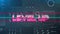Animation of pink metallic text level up, over neon lines, on grey interface