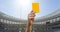 Animation of referee holding yellow card on rugby pitch in sports stadium