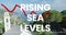 Animation of rising sea levels over financial graph and seascape