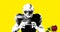 Animation of roses falling over black and white american football player holding ball, on yellow