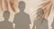 Animation of silhouettes of children and palm tree shadow on beige background