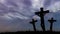 Animation of silhouettes of three Christian crosses With cloudy sky in background