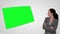 Animation of smiling businesswoman presenting a green screen