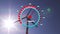 Animation of speedometer over wind turbines and sun