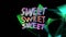 Animation of sweet in bending colourful text over floating blue geometric shapes on black