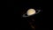 Animation with time lapse about the orbit of the planet Saturn and moons.