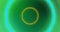Animation of yellow, blue and green pulsating neon circles on green background