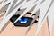 Anime pretty boy face with blue eye and grey hair. Manga hero art background concept. Vector cartoon look illustration