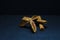 Anise star and cinnamon sticks on a black background