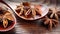 Anise stars in a wooden spoon on a wooden table. Close-up. Food concept.Camera motion