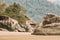 Anjadip, Goa, India. Big Cobblestones Standing On Famous Palolem Beach In Summer Sunny Day