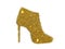 Ankle boot on high heel of golden glitter sparkle on white background