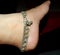 Anklet on women feet.