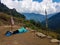 Annapurna Base Camp hiking trek, Himalayas, Nepal. November, 2018. A hiker resting on the ground after the long hard walk and