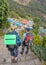 Annapurna Base Camp hiking trek, Himalayas, Nepal. November, 2018. Hikers and their Nepal guide on the way to Chomrong