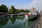 Annecy city, Thiou canal, boats and castle, Savoy, France