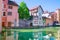 Annecy, France. Old medieval buildings reflect in the water