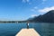 ANNECY, FRANCE - SEPTEMBER 22, 2012: Tourist walks on the pier