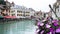Annecy, France - September 9, 2021: the view of city canal with medieval buildings in Annecy Old Town, Restaurant near the River T