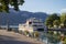 Annecy - The lake, promenade and the ship on the lake in morning light