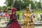 ANNEVOIE GARDENS, BELGIUM - June 9, 2019: Women standing in masks and masquerade costumes during Venetian carnival in Annevoie