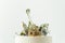 Anniversary luxury cake with white and blue cream cheese frosting decorated with transparent caramel splash figure on top and