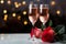 Anniversary and Valentines concept Red roses and sparkling rose wine glasses