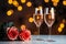 Anniversary and Valentines concept Red roses and sparkling rose wine glasses