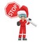Annoyed industrial mechanic worker with Santa Claus hat with stop sign. Engineer with his personal protective equipment. Safety