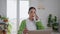 Annoyed woman picking up phone at modern office closeup. Lady reacting on call