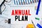 ANNUAL PLAN concept with telephon and office tools