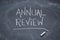 Annual review blackboard sign