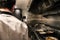 Anonymous chef standing on restaurant kitchen