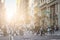 Anonymous crowd of people walking across the intersection in SoHo New York City