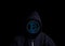 Anonymous Crypto Hacker in hood with bitcoin