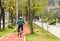 Anonymous cyclist is cycling on the bycicle lane.