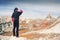 Anonymous female hiker in front of a beautiful mountain scenery.Three peaks. Dolomites. Italy