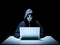 Anonymous hacker with laptop. Concept of hacking cybersecurity, cybercrime, cyberattack, etc
