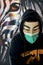 Anonymous hacktivist with medical mask