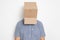 An anonymous man with a box on his head concealing his identity I